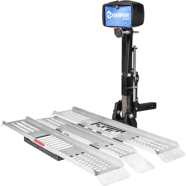 Vehicle lift platform with "Harmar" logo, featuring foldable, perforated metallic ramps for mobility aid transport.