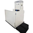 Vertical platform lift with a ramp, safety gate, and control panel, designed for wheelchair accessibility.