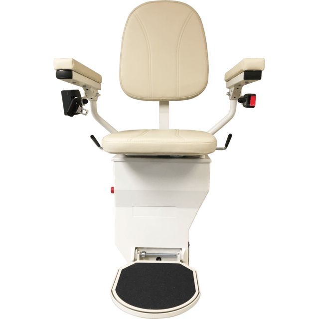 A beige stairlift chair with armrests and a footrest, facing forward.