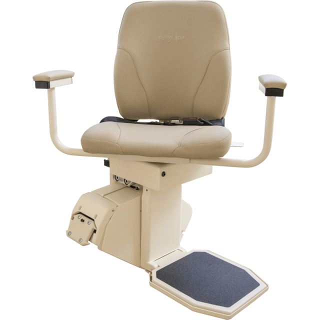 A beige stair lift chair with padded seat, armrests, and a footrest, mounted on a motorized platform.
