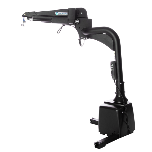 Black mobility lift with a sturdy arm and hook, featuring a control panel and a base designed for vehicle installation.