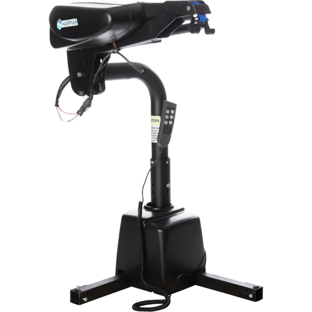 Black Harmar vehicle lift with control switch, used for assisting mobility devices into vehicles.