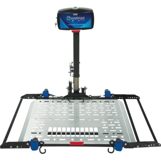 A wheelchair lift platform with a vertical support post and screen at the top. The platform has a perforated metal surface and is supported by a black metal frame.