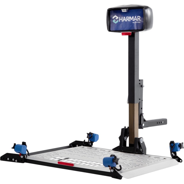 A Harmar mobility lift platform with a tilting ramp and blue securing clamps, designed for transporting wheelchairs or scooters on vehicles.