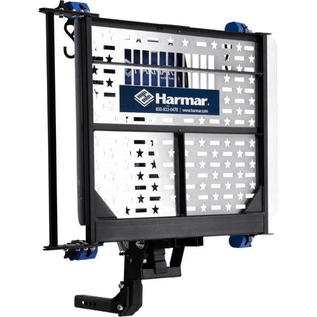Harmar vehicle lift platform with a star and stripe pattern, designed for mobility devices.
