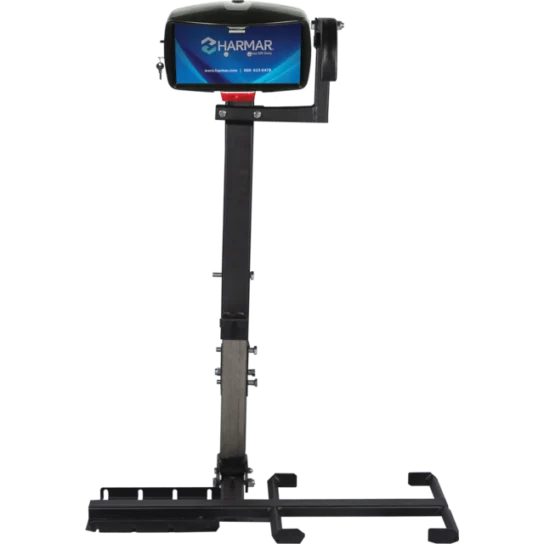 A motorized mobility lift with a vertical support column and attached platform for lifting wheelchairs or scooters.