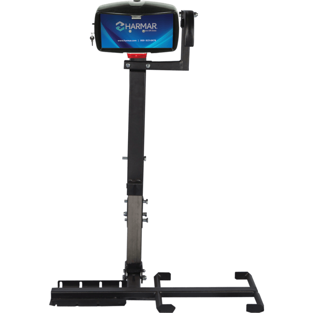 A motorized mobility lift with a vertical support column and attached platform for lifting wheelchairs or scooters.