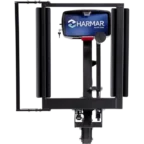 Metal vehicle lift with Harmar logo, featuring a sturdy black frame and a hitch attachment.