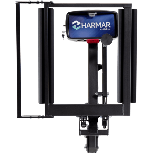 Metal vehicle lift with Harmar logo, featuring a sturdy black frame and a hitch attachment.
