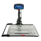 A platform lift with a monitor displaying the Harmar logo, designed for transporting mobility devices, featuring a durable metal platform and a securing mechanism.