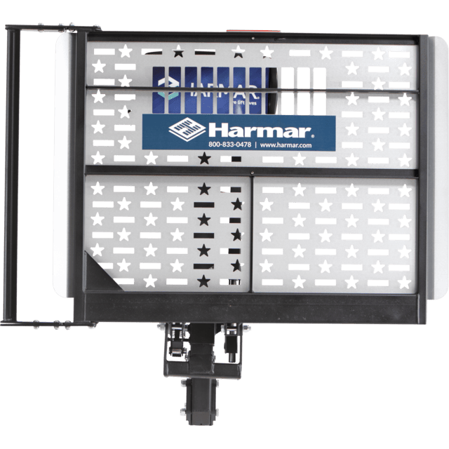 Harmar lift platform with star-patterned surface, branded logo, and contact information visible.