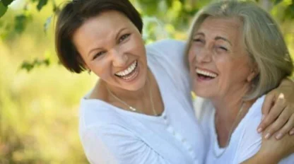 mother and daughter laughing