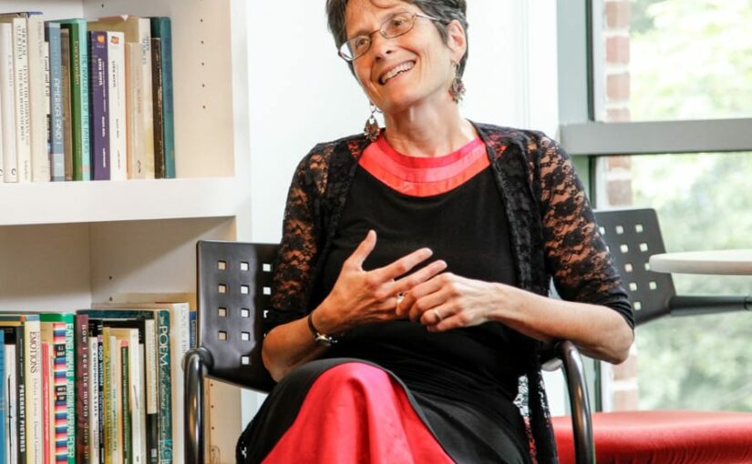 teacher sitting in a chair