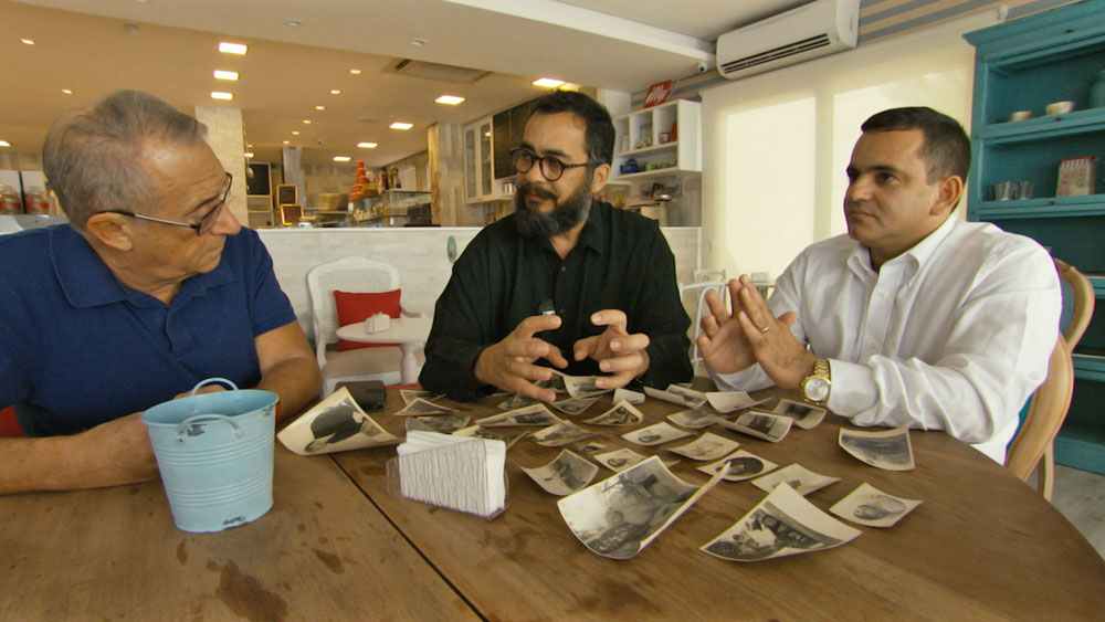 Children of the Inquisition Director-Joseph-Lovett,-Artist-Carlos-De-Medeiros-and-his-cousin-Johnelson-explore-family-genealog