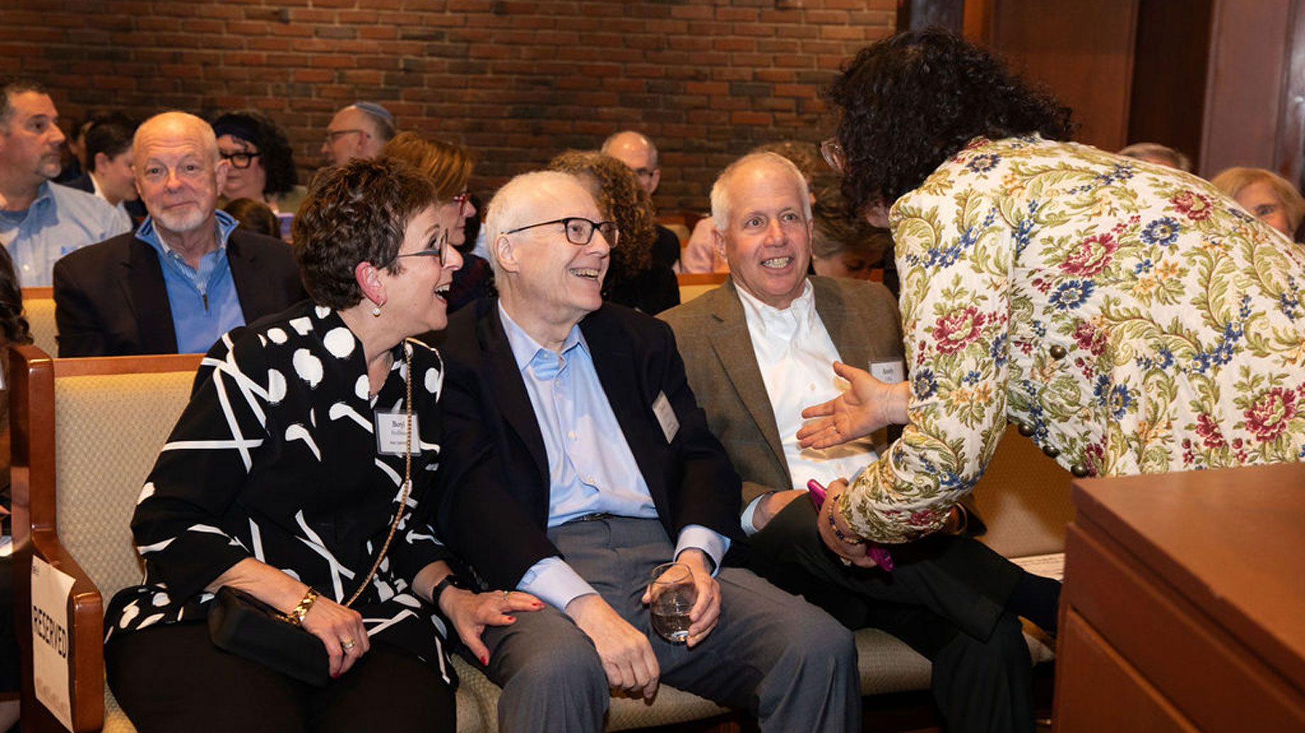 smiling honoree and guests