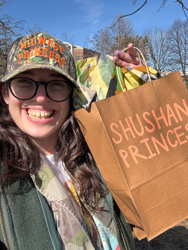 Michaela-Brown holding groceries