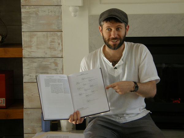 Matthew Ponak reading a book