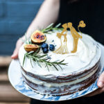Woman holding 3D pen cake with figurines-art