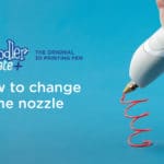 Changing nozzle: 3D drawing with a 3D pen on blue background.