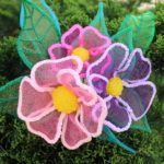 Mesh 3D pen art: 2 flowers on a bush.