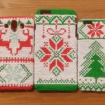 Three knitted cell phones on table - 3D pen art