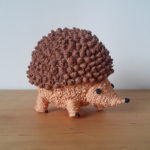 3D pen art of a small chocolate hedgehog.