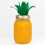 3D pen art: Pineapple in jar with green leaf.