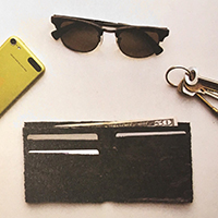 Doodler Wallet on table with cell phone and 3D pen art | stencil