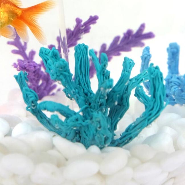Coral stencil with swimming fish and rocks in a 3D pen bowl