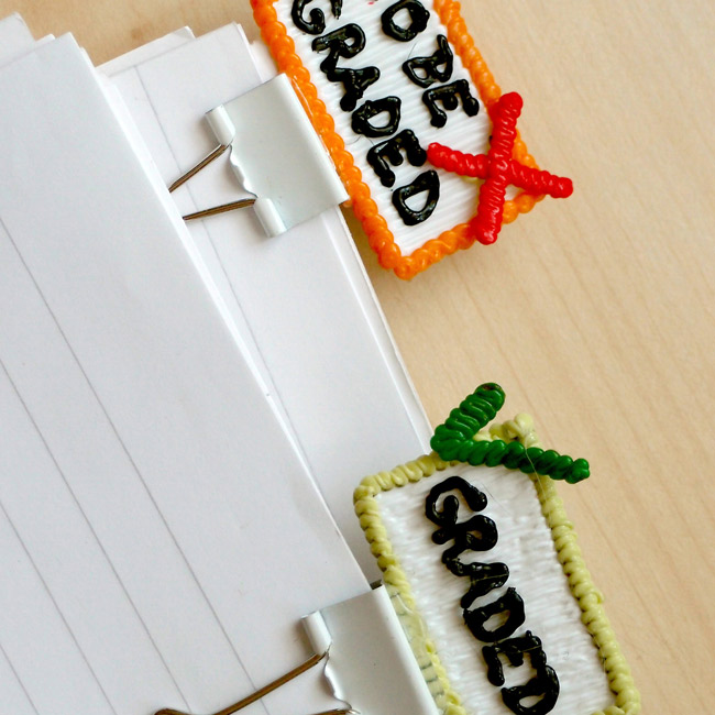 3Doodler Paper Clip Marker with 3D cake drawings on a table