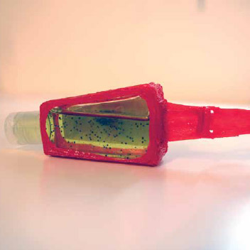 Vibrant 3D pen art: red toothbrush with green toothpaste in a handsanitizer holder | 3D Pen Template Stencil