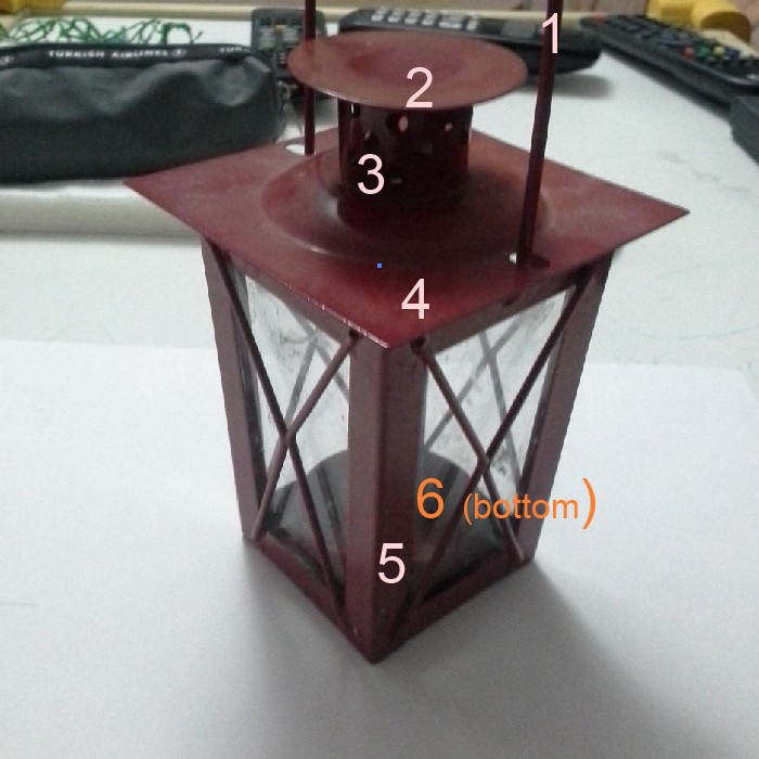 Red lantern with numbers on table - 3D pen art.