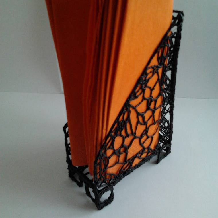 3D pen art: Black wire holder with orange umbrella.