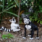3D pen art: Two standing animal figurines in dirt