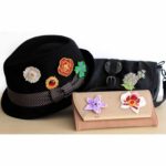 3D pen art: Hats, purse, Bling Flower on table
