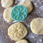 3D pen creates cookie art on table with cookie cutter