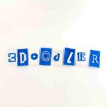 Paper 3D pen art forms the word "Fridge Magnets