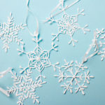 Snowflakes on blue surface with ribbon - 3D pen art