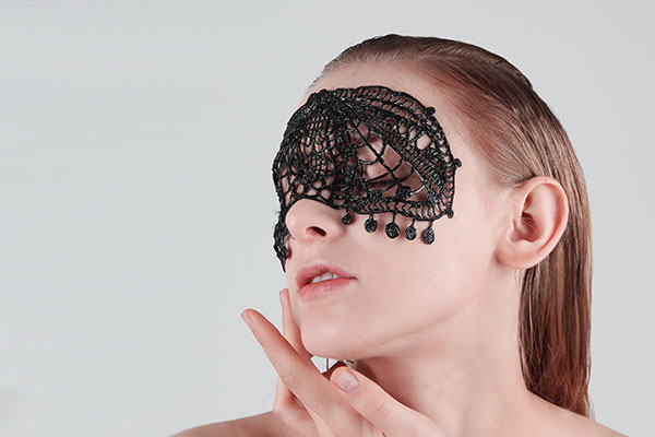 3D pen art: Woman with black lace mask.