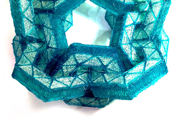 Blue 3D pen art on table