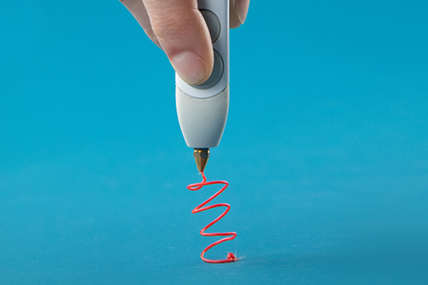 3D pen spiral on blue surface