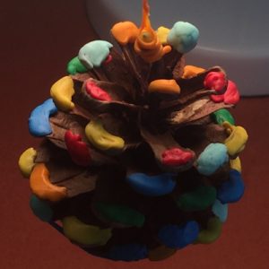 3D pen art: Pine cone with candy decorations.