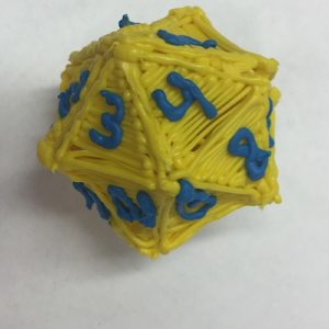 IMG_7465 - 3Doodler 3D pen art: Yellow and blue plastic toy with numbers.