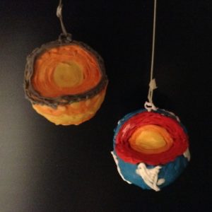 3D pen art: Clay and yarn ornaments hanging.