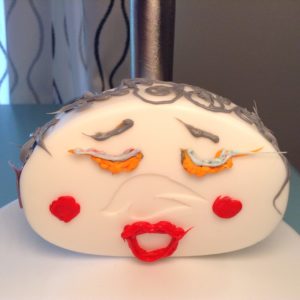 3D pen art: Cake with face & red lips.