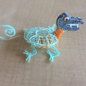 Dinosaur toy crafted with yarn using 3D pen