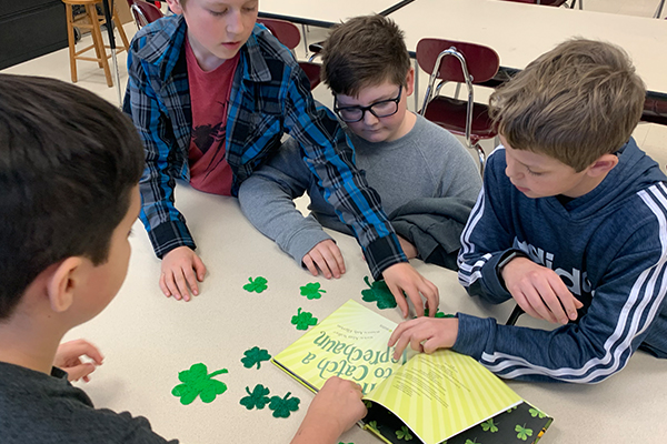 Boys with book and shamrock puzzle, 3D pen art