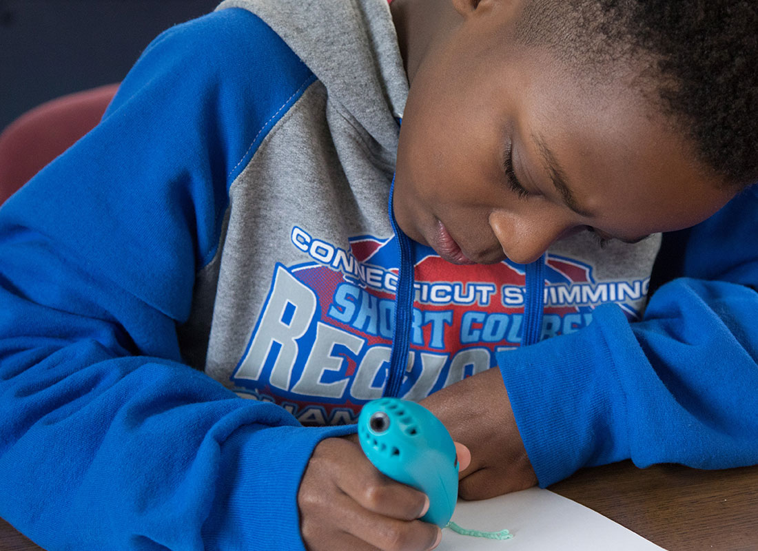 Boy in blue sweatshirt, 3D drawing with green pen