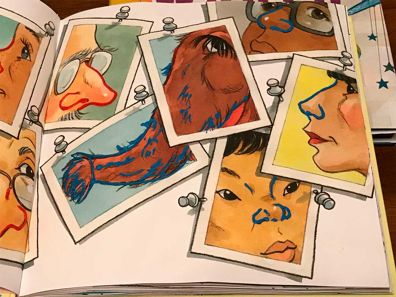 3D pen art featuring portraits of diverse faces.