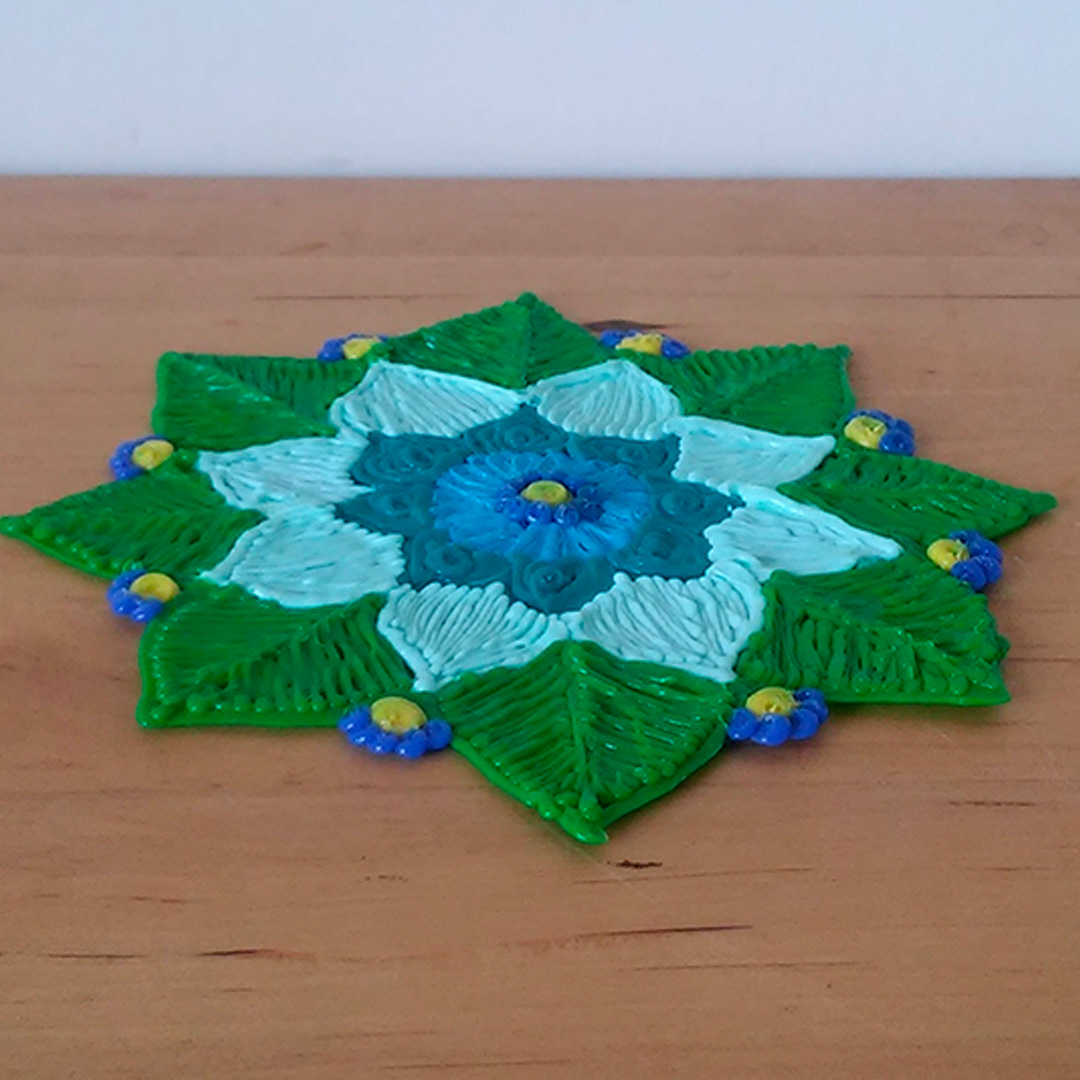 Small blue flower on green leaf - 3D pen art